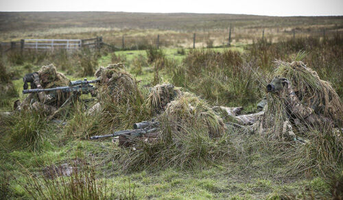 Pictured are Snipers from 34 Squadron, The Royal Air Force Regiment based at RAF Leeming, undertaking Live Firing Tactical Training at the Otterburn Training Area. This training formed part of the Contingency Operating Training for the Joint Expeditionary Force. With a strength of 164 personnel, including specialist engineering and support staff, the Squadron’s firepower is provided by a wide range of infantry weapons including sniper rifles, general purpose machine guns and light and medium mortars. Fully air portable, the Squadron’s cross-country mobility is provided by a variety of off road platforms battlefield communications systems and a highly effective range of surveillance and night observation equipment which help complete 34 Squadron’s inventory to make it a flexible and powerful force capable of deploying anywhere in the world to defend British air assets or to take part in wider military action.