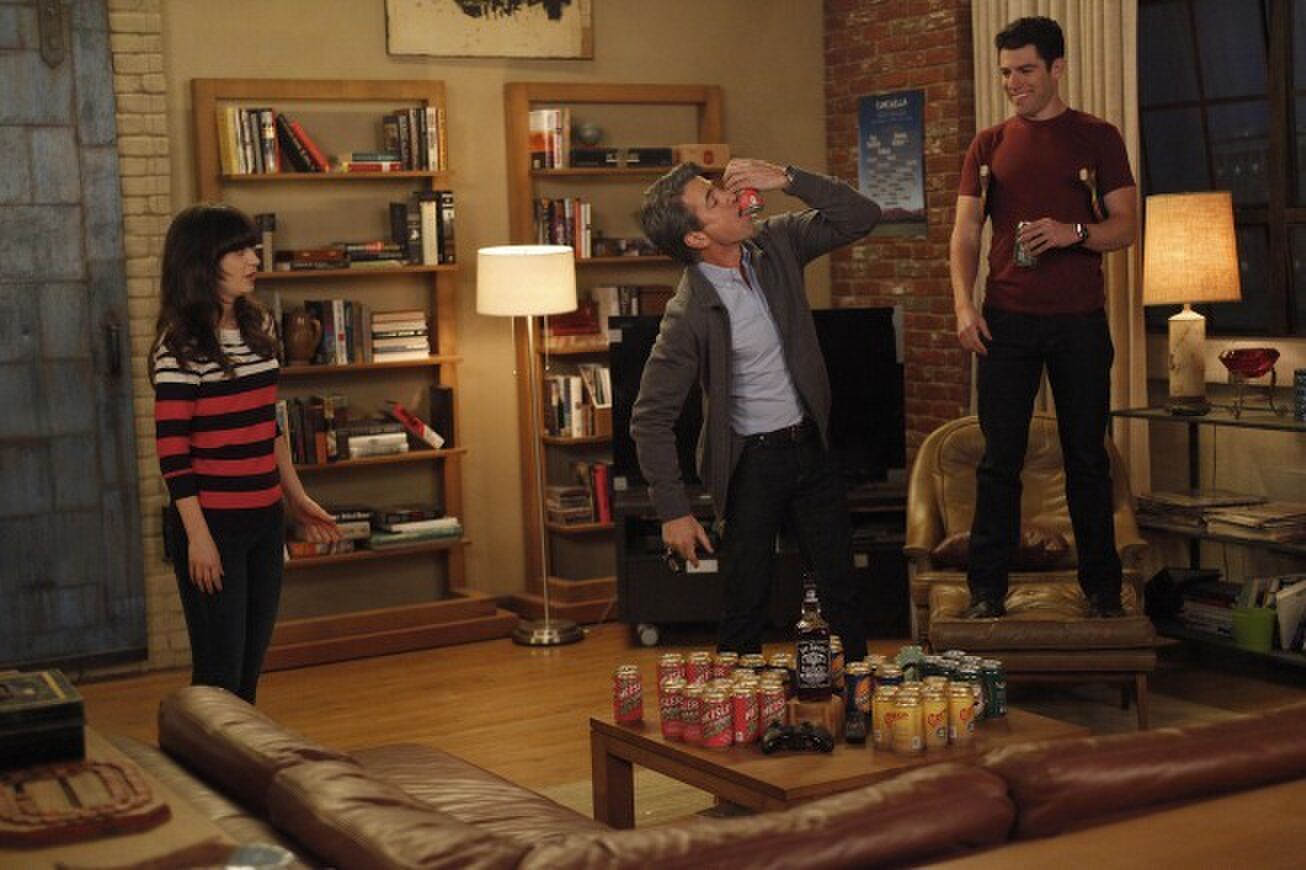 NEW GIRL: The gang plays drinking games when Jess (Zooey Deschanel, L) invites Russell (guest star Dermot Mulroney, C) to spend the weekend at the loft in the "Normal" episode of NEW GIRL airing Tuesday, April 10 (9:00-9:31 PM ET/PT) on FOX. Also pictured: Max Greenfield (R). ©2012 Fox Broadcasting Co. Cr: Greg Gayne/FOX