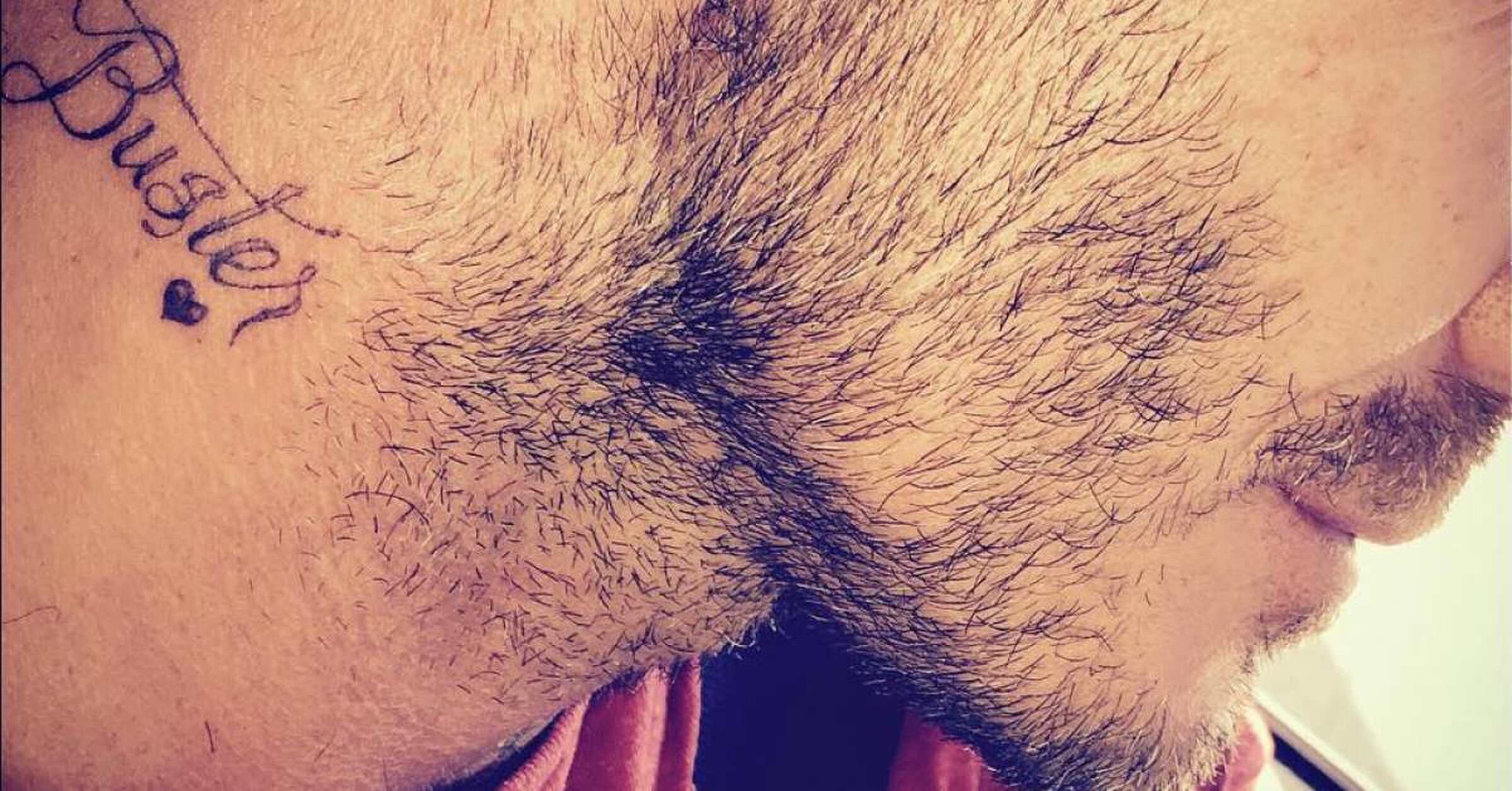 david beckham tattoo buster