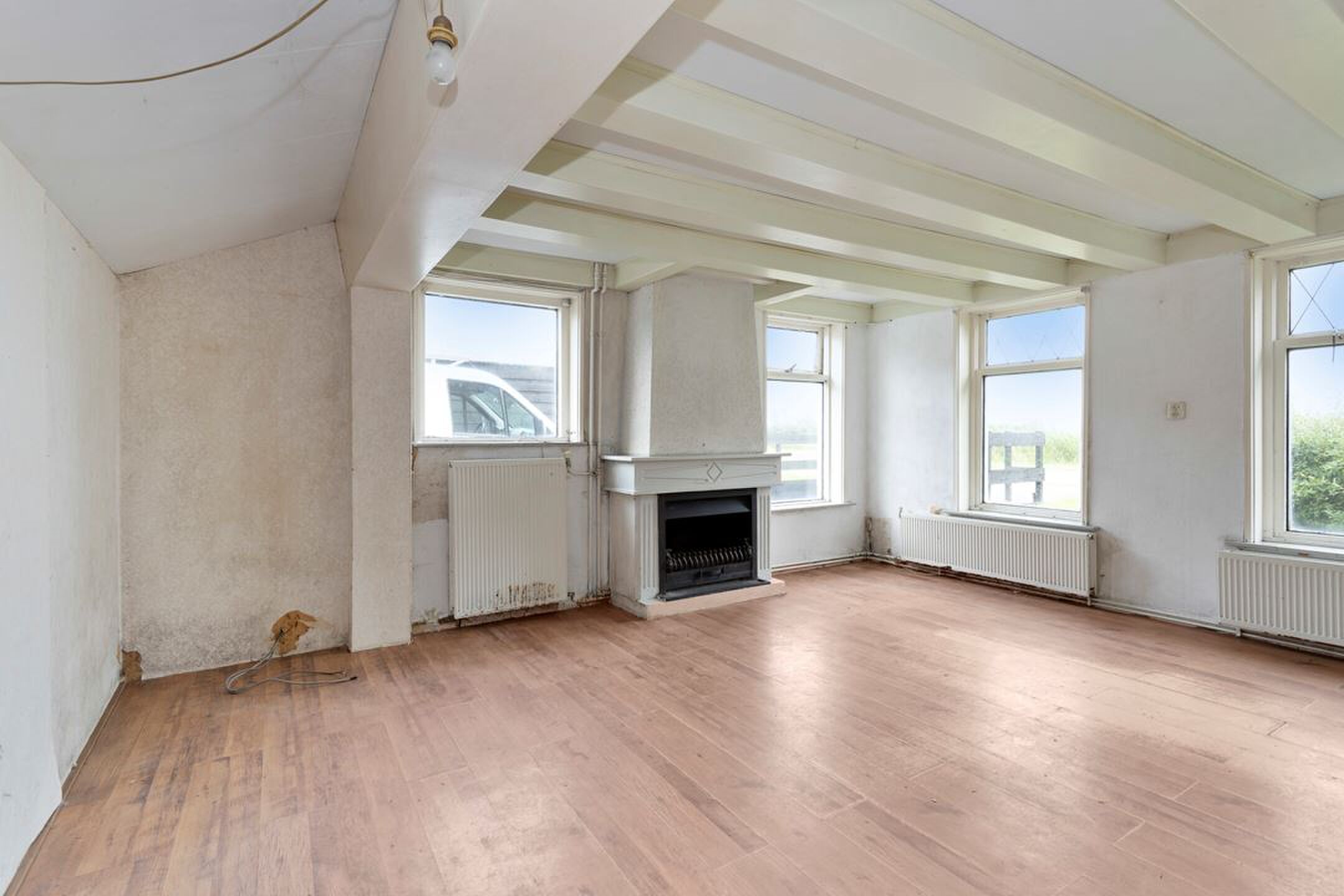 Vrijstaande opknapper woonkamer