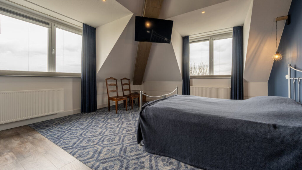 De slaapkamer van de woning van Olav Kooij.
