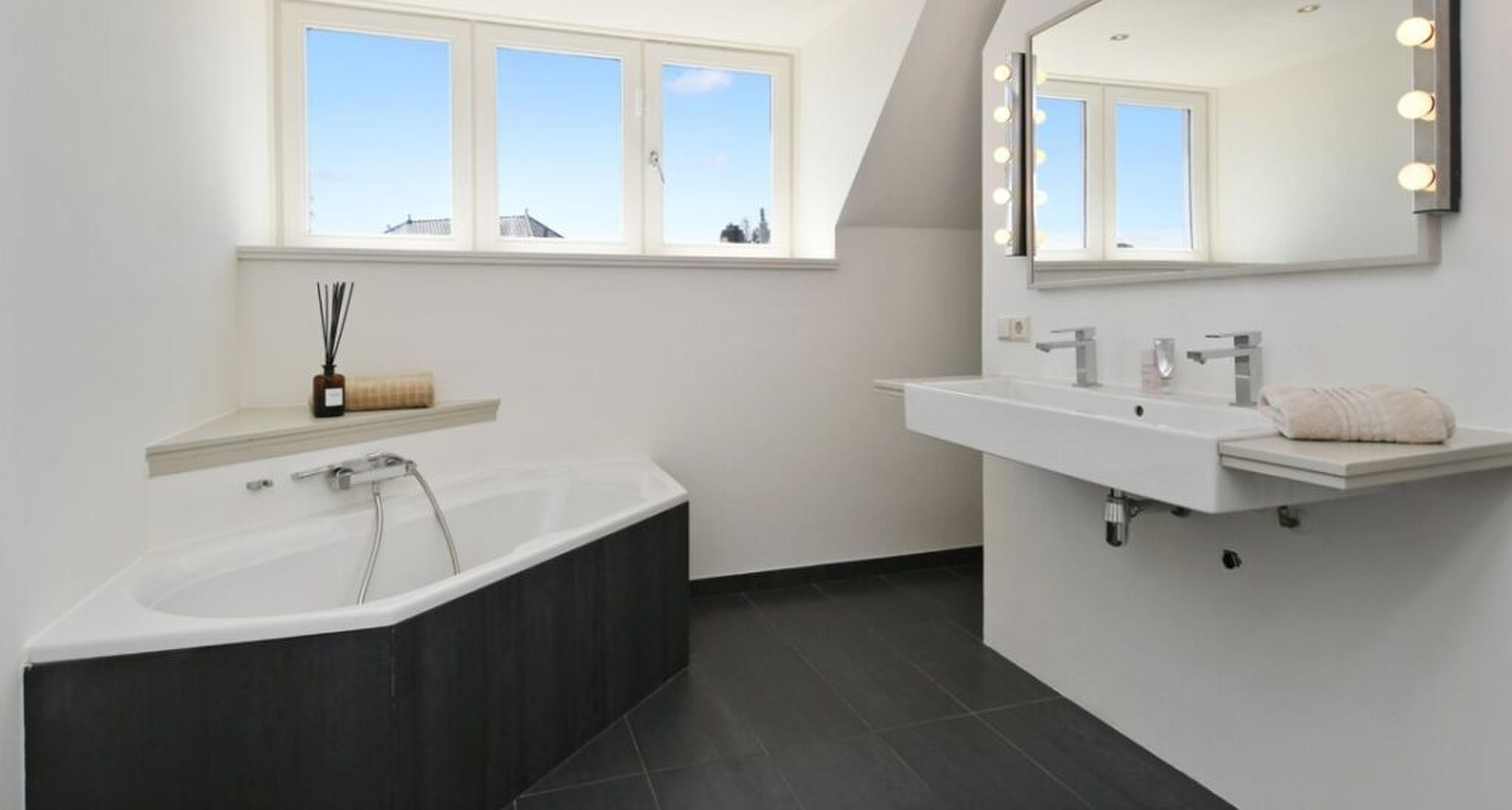 De badkamer