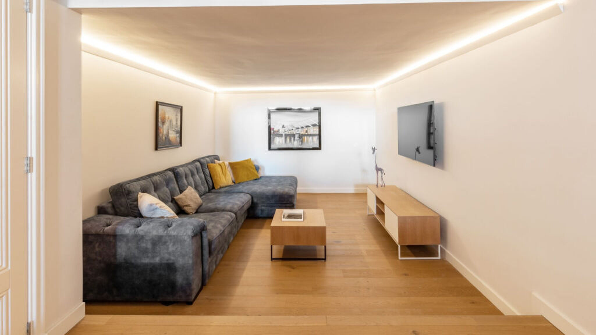 De woonkamer van Alain Clark