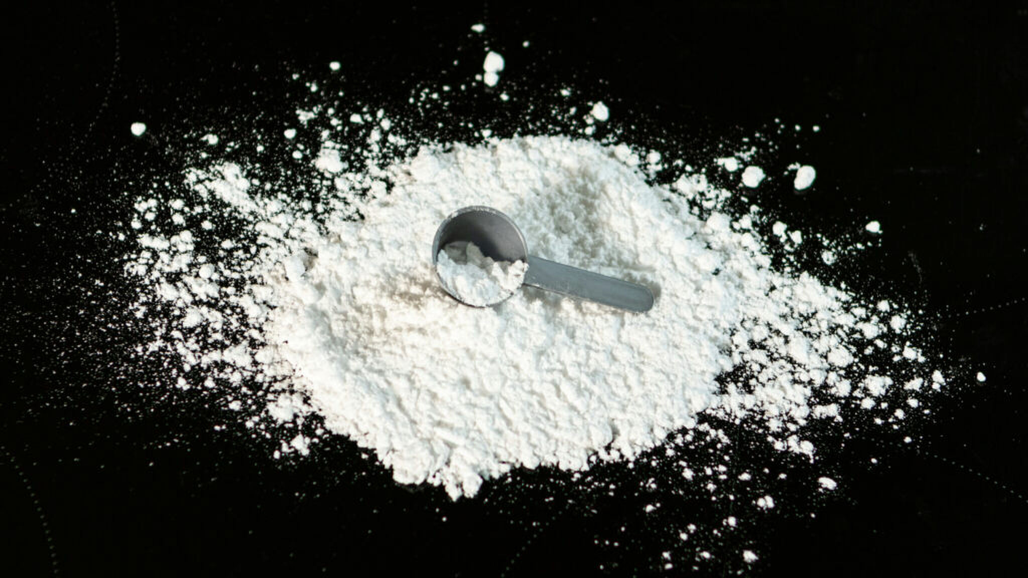 Creatine met volume lepel in kwestie