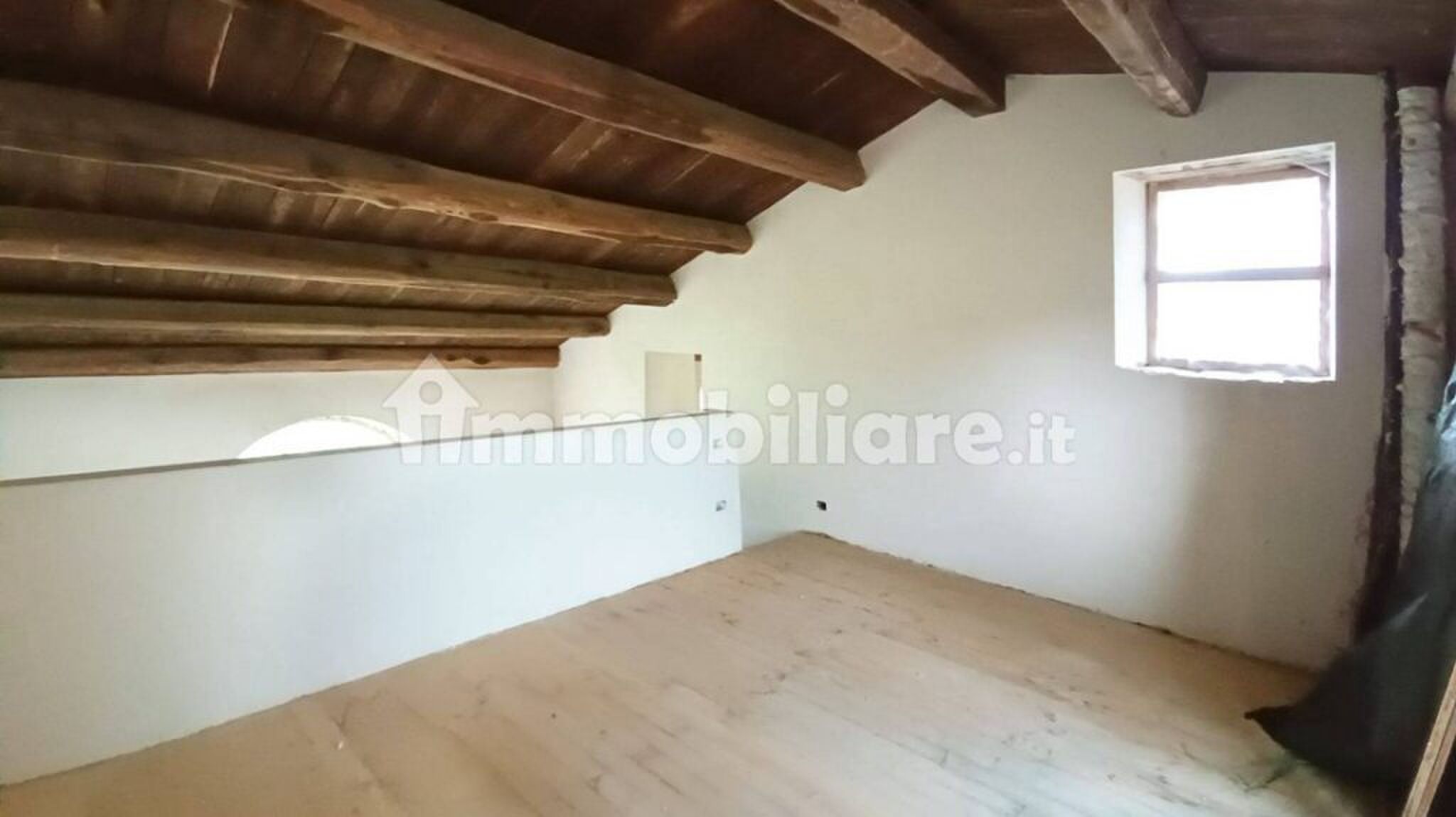 De bovenste verdieping van de woning.