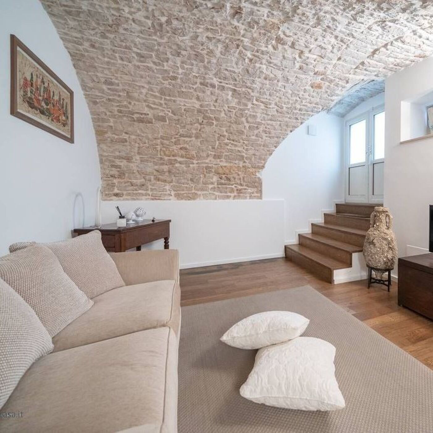 De woonkamer van het karakteristieke huisje in Itali&euml;