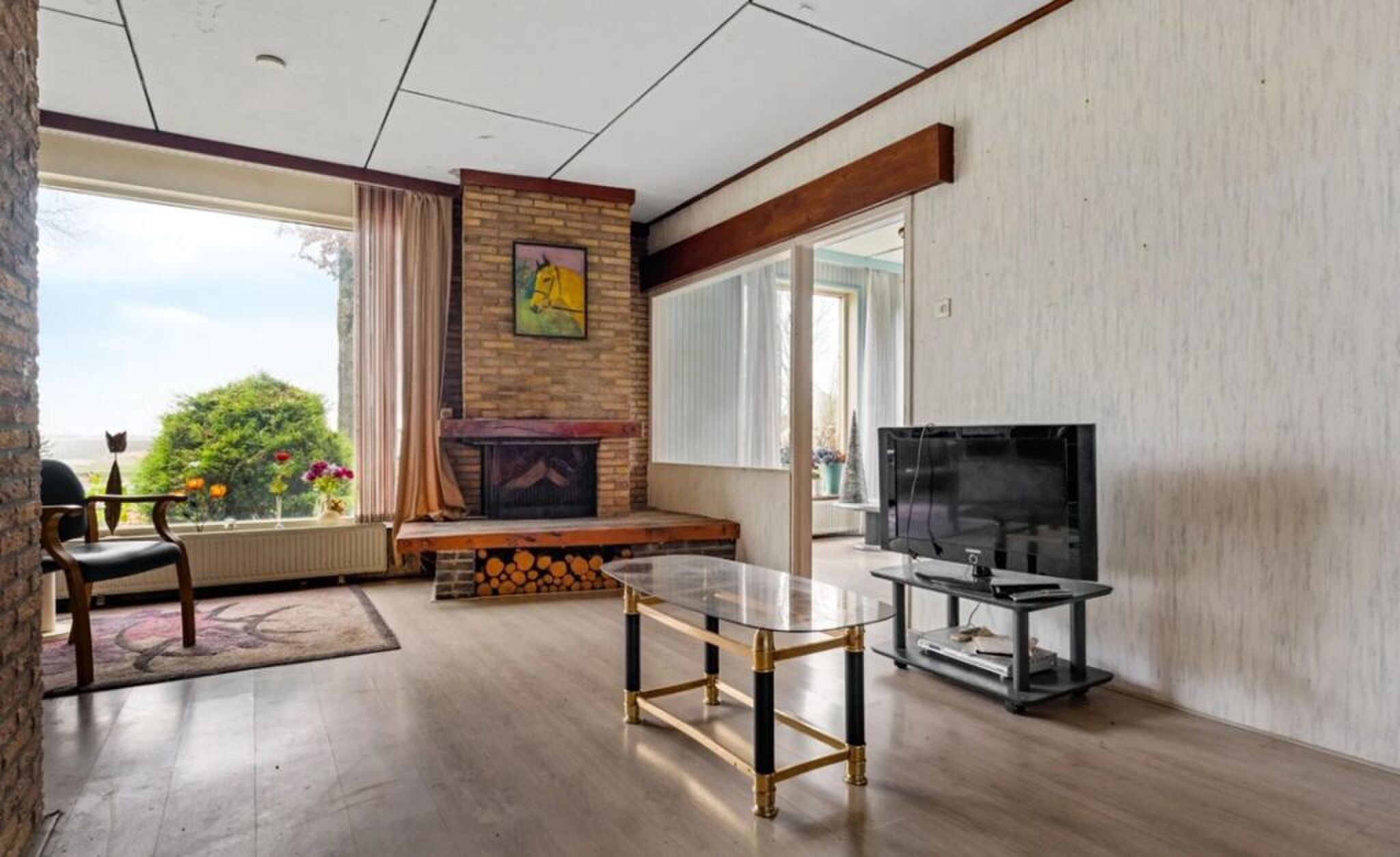 De woonkamer met potentie.