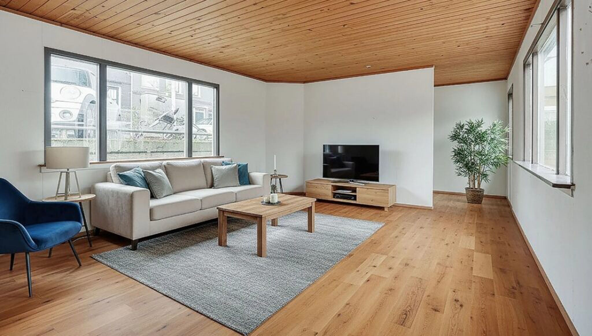 Een 'artist impression' van hoe de woonkamer van de woonboot in Amsterdam kan worden.