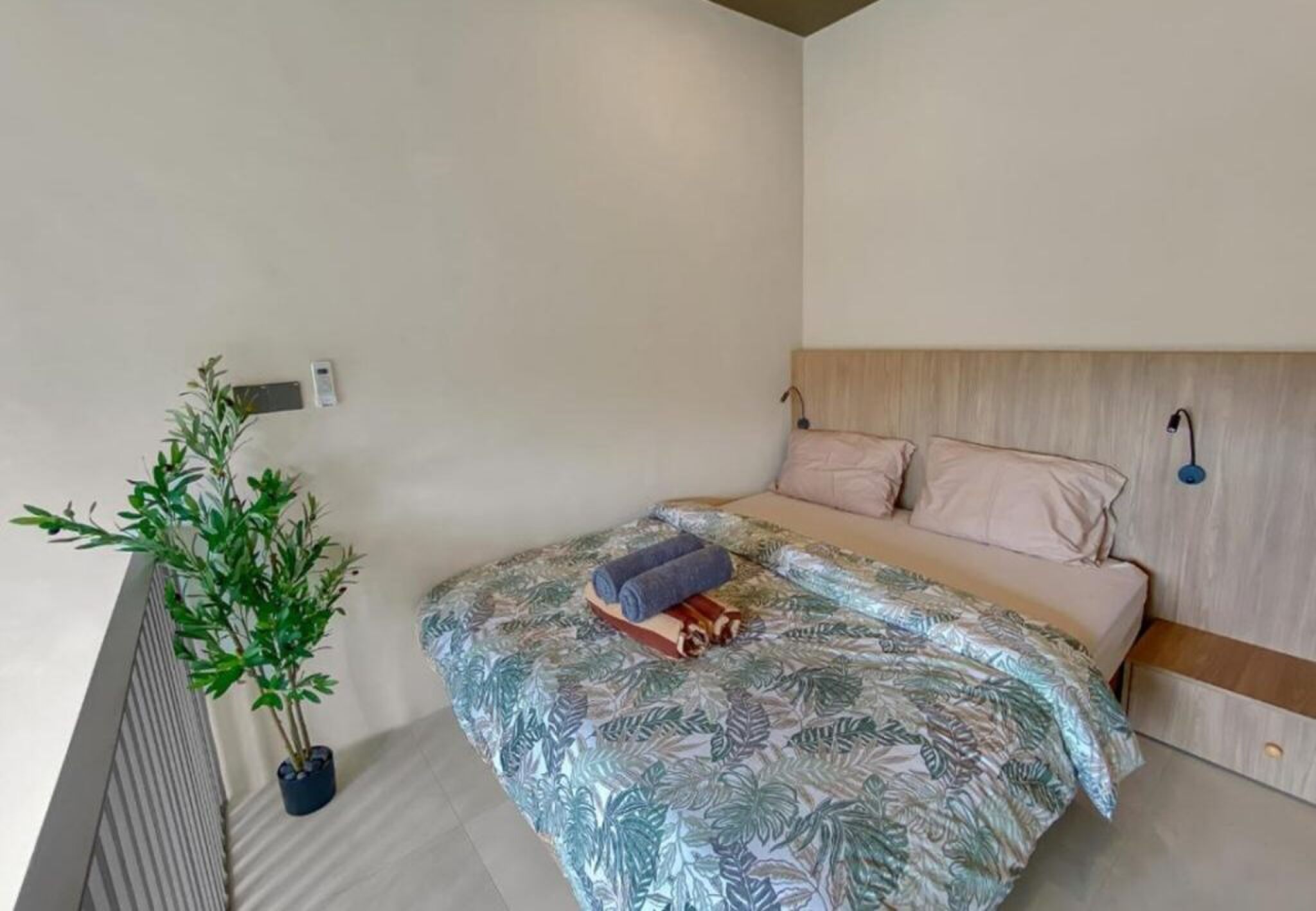 De strakke slaapkamer.