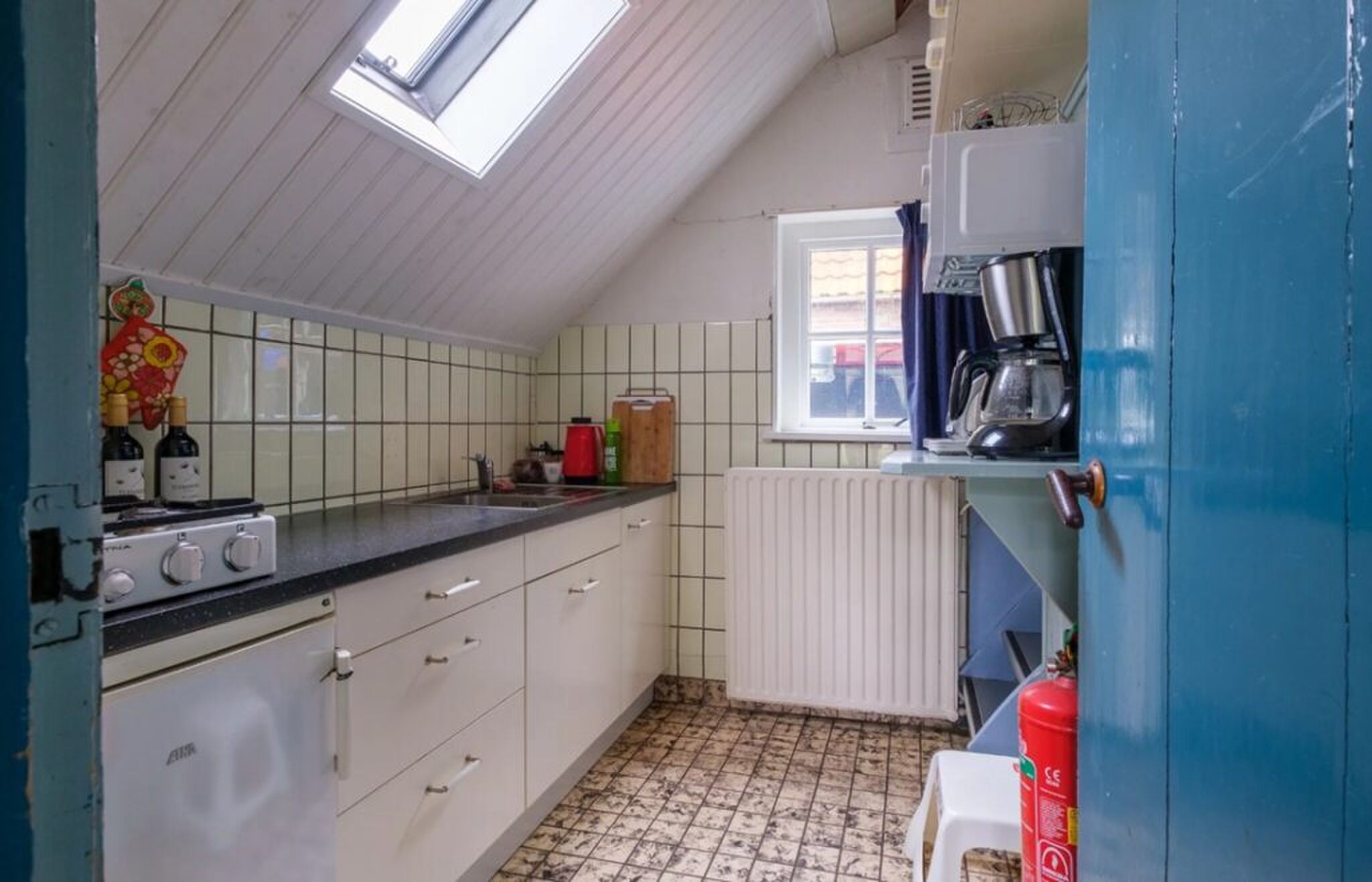 De woonkeuken die toe is aan een verbouwing.