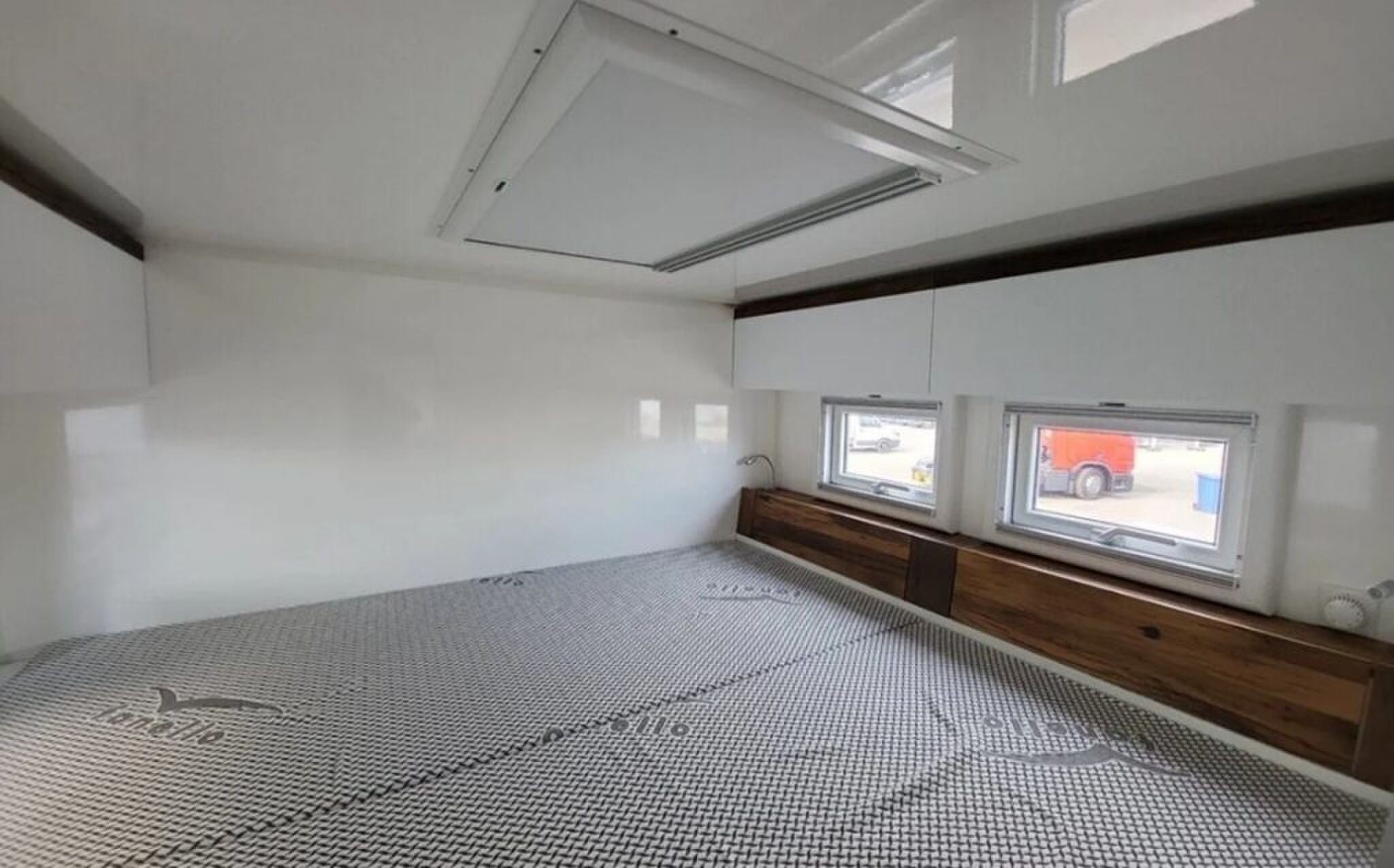 De slaapruimte met strakke afwerking.