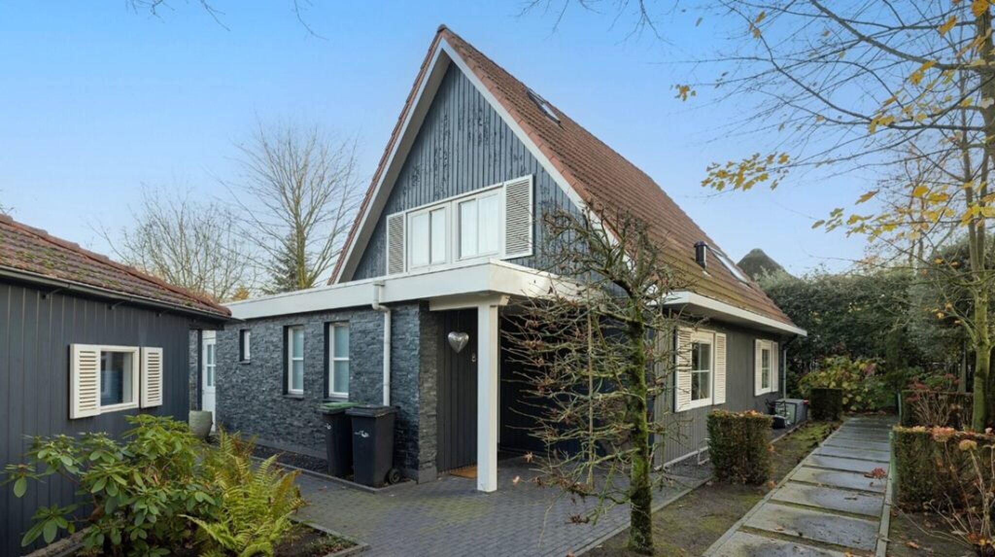 Het guesthouse dat bij de Brabantse villa hoort.