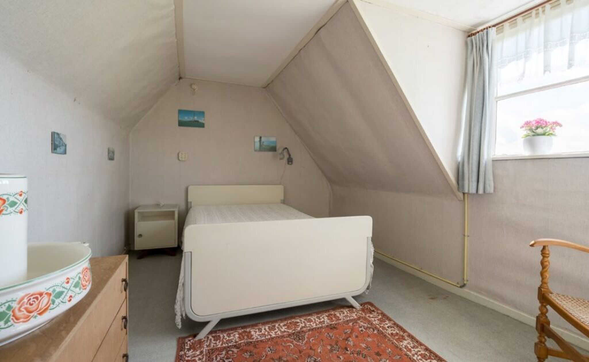 Een van de slaapkamers op de verdieping.