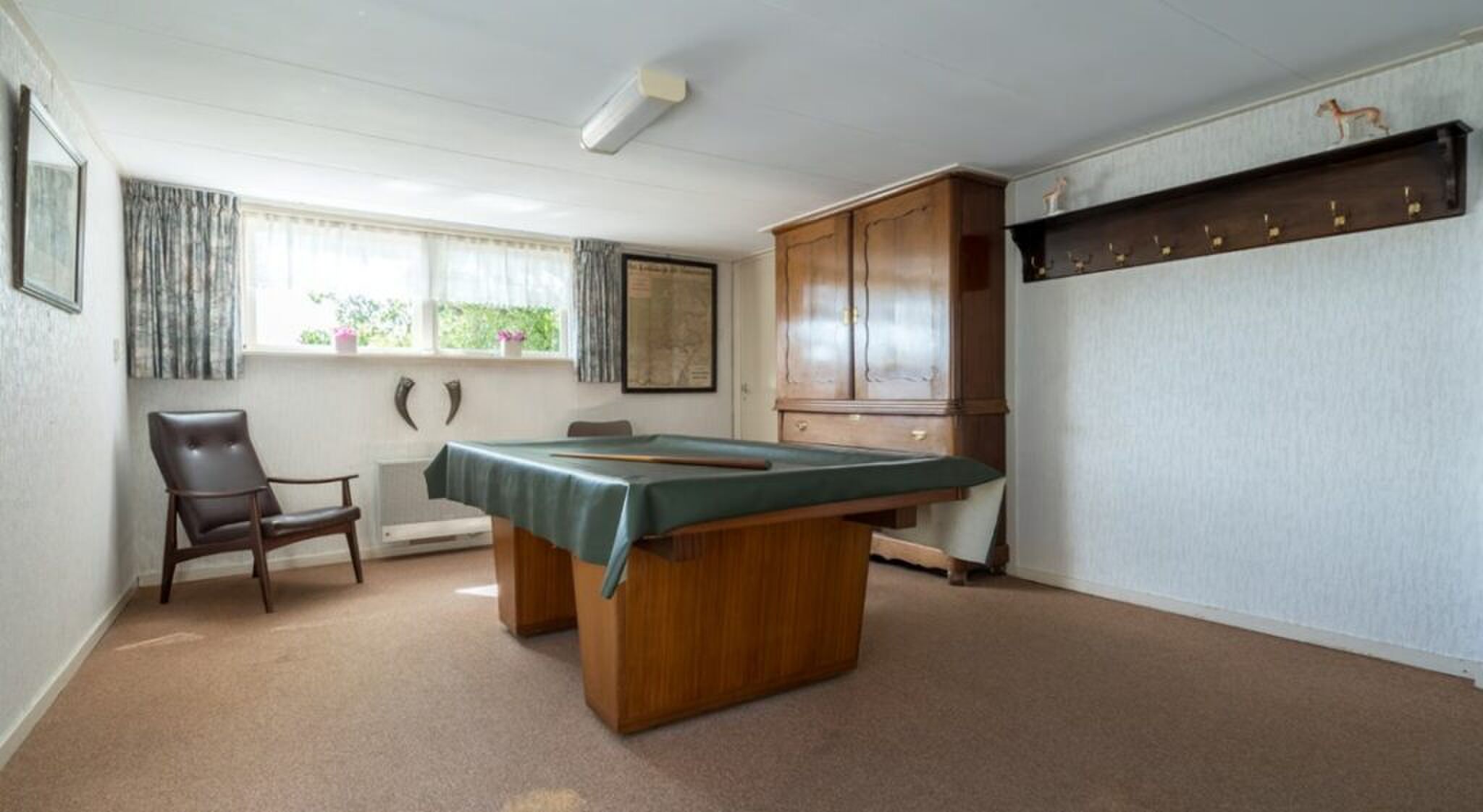 Een biljartkamer in de woning.