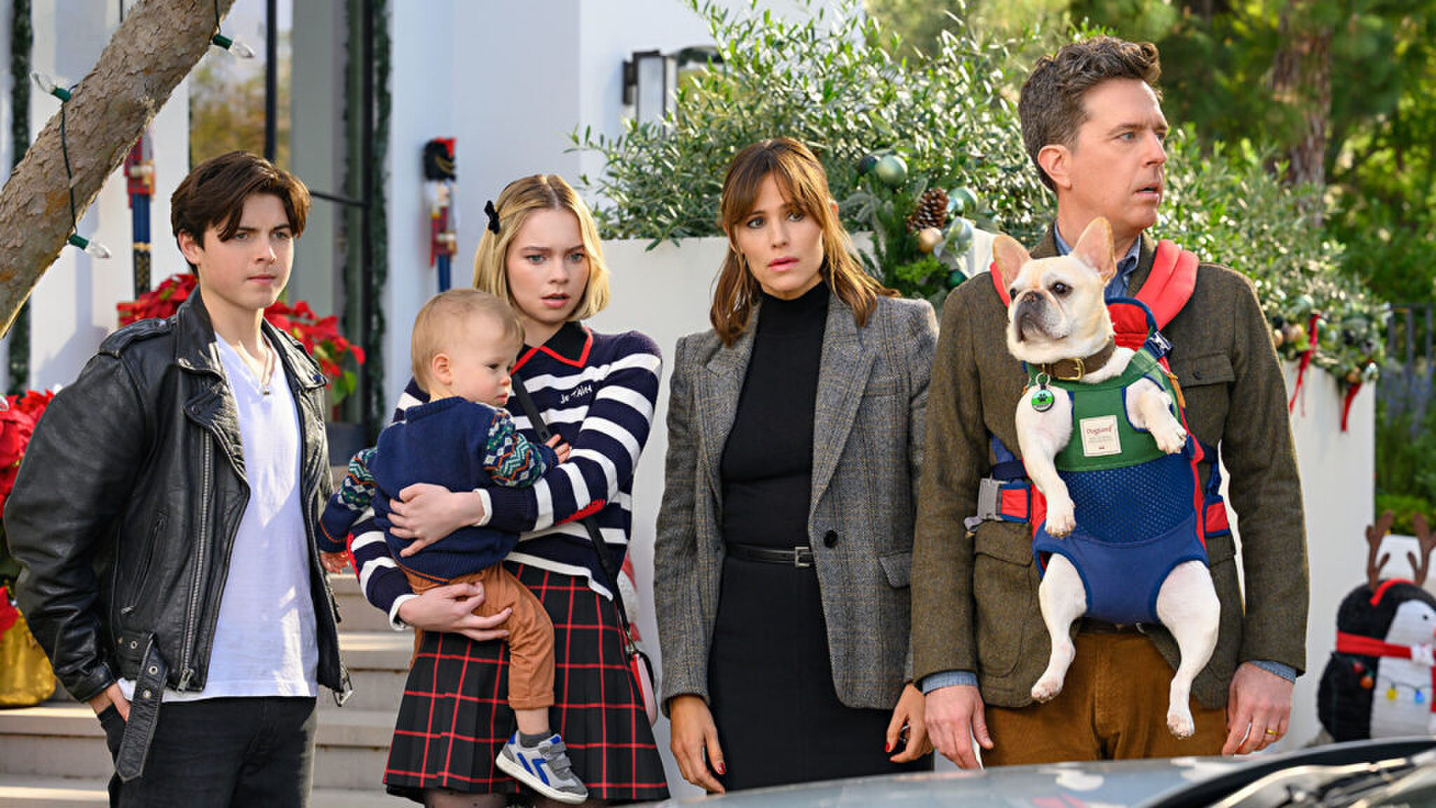 Een familie die geschrokken kijkt.