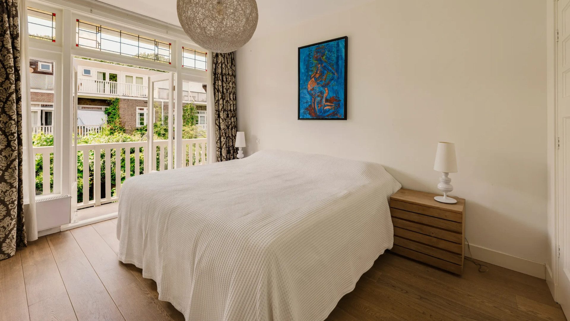 De slaapkamer met eigen balkon.
