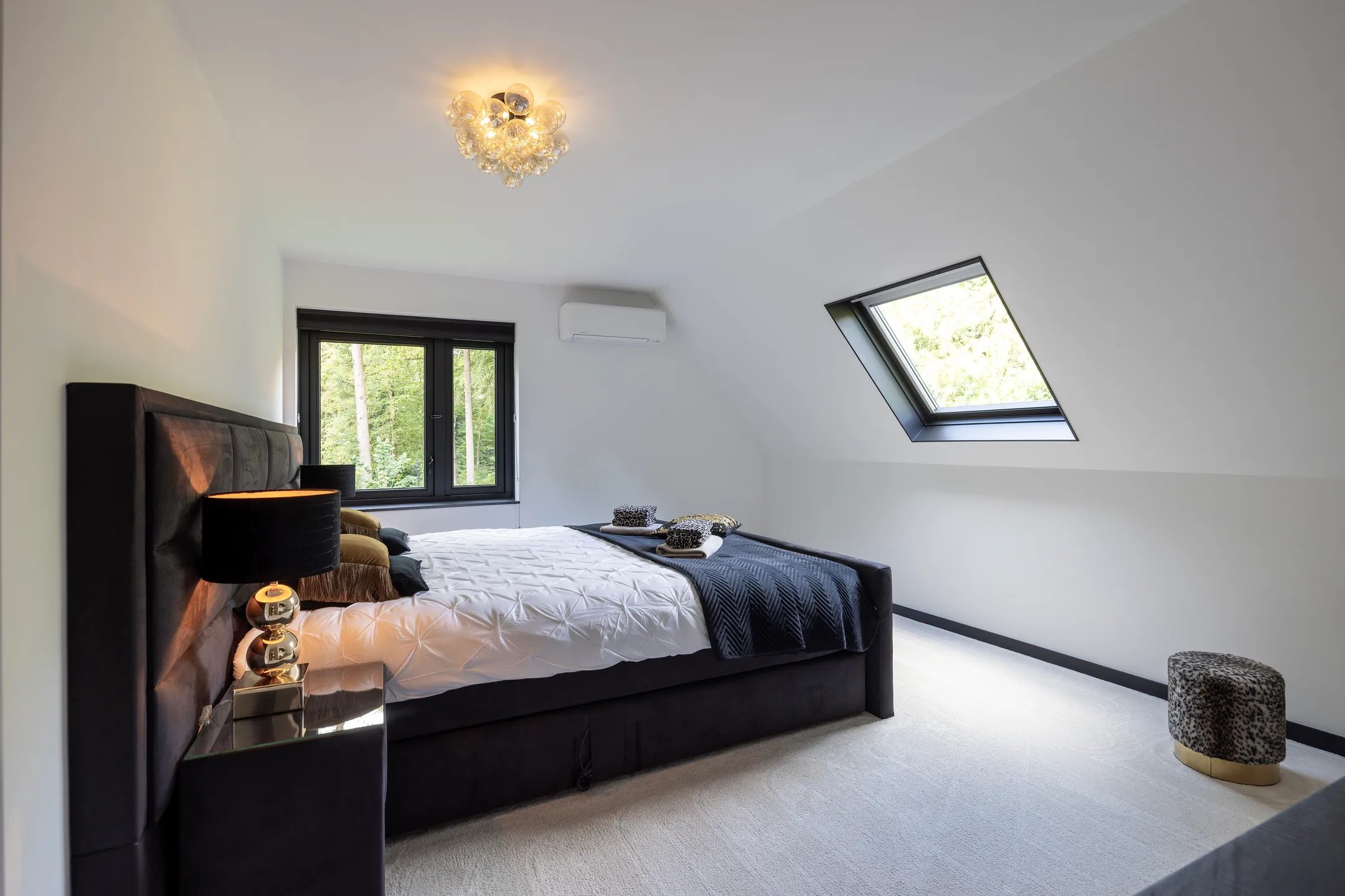Een slaapkamer van een landhuis in Epe. 