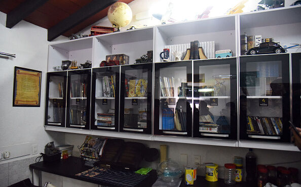 View of Brazilian drug trafficker Jarvis Chimenes Pavao's cell at Tacumbu prison in Asuncion on July 28, 2016. Three rooms, a plasma TV, a library, and even a collection of DVDs of Colombian Pablo Escobar TV series, Jarvis Pavao Chimenes lived in a luxury cell in Tacumbu prison, one of the most crowded of Paraguay. / AFP / NORBERTO DUARTE / TO GO WITH AFP STORY (Photo credit should read NORBERTO DUARTE/AFP/Getty Images)