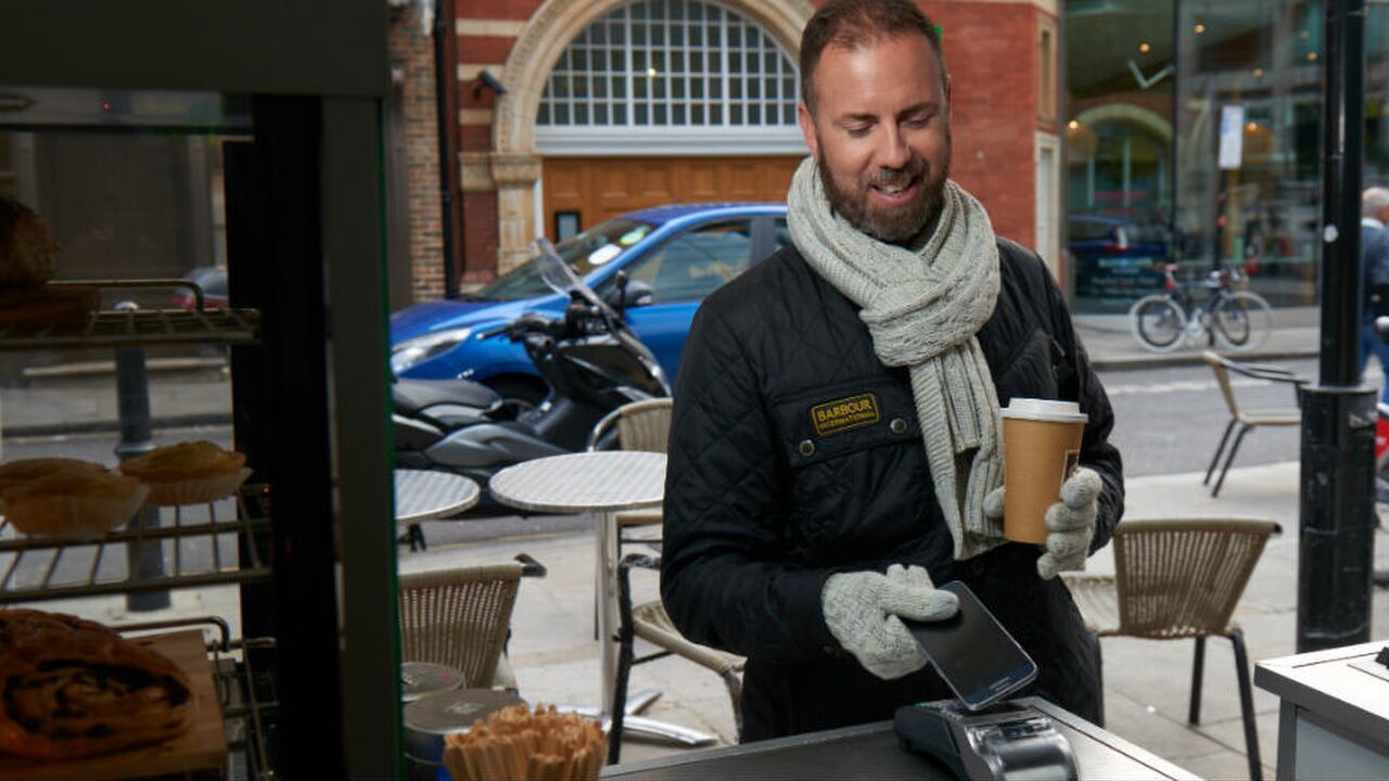 Illustratie voor: Vergeet de portemonnee: vanaf nu betalen we met onze smartphone