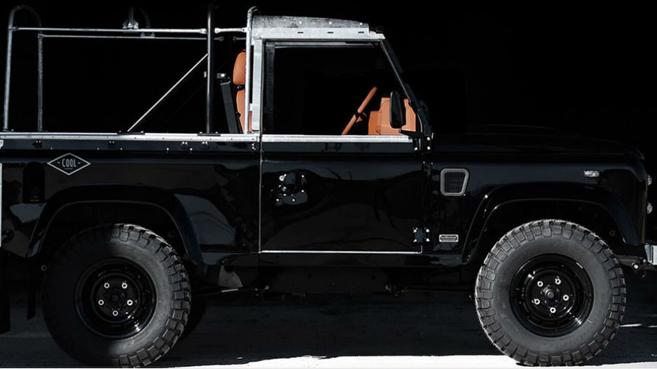 All-black land rover defender man man