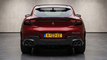 Een Ferrari met rode achterlichten.