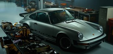 porsche garage man man
