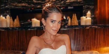 sylvie meis zet kerstboom op met wel een heel kort jurkje
