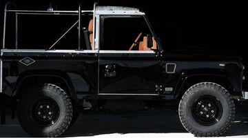 All-black land rover defender man man