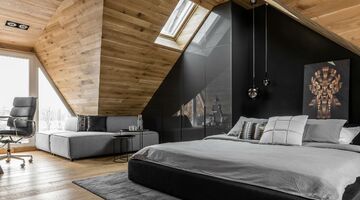 Stijlvolle zolderslaapkamer MAN MAN