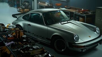 porsche garage man man