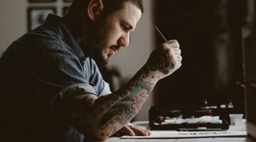 Tattoo ontwerpen MAN MAN