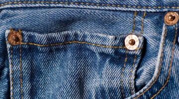 jeans metalen knoopjes spijkers broekzakken