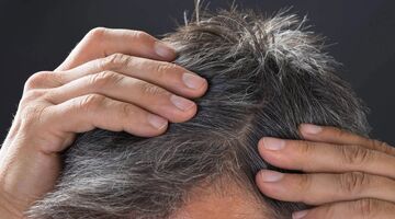 Wetenschappers komen steeds een stap dichterbij een remedie voor grijze haren