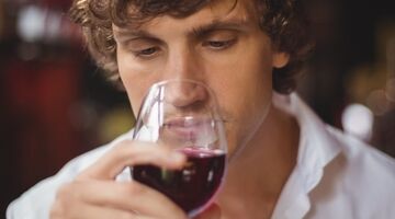 waarom heb ik hoofdpijn na rode wijn