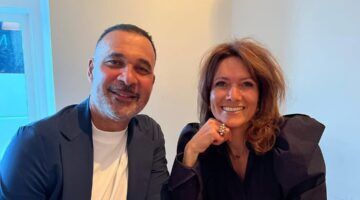 Ruud Gullit samen met zijn vriendin
