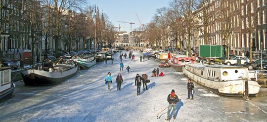 schaatsen grachten amsterdam MAN MAN