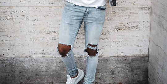Illustratie voor: 10 tapered fit jeans voor mannen met grote bovenbenen