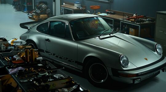 porsche garage man man